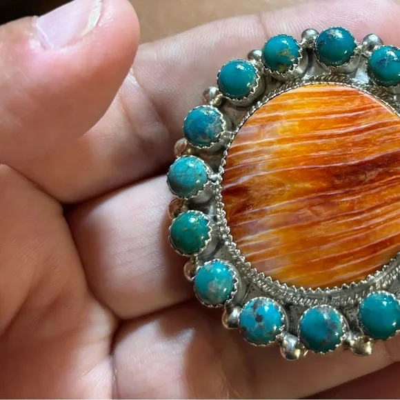 Beautiful Native American made sterling silver,turquoise, coral adjustable ring